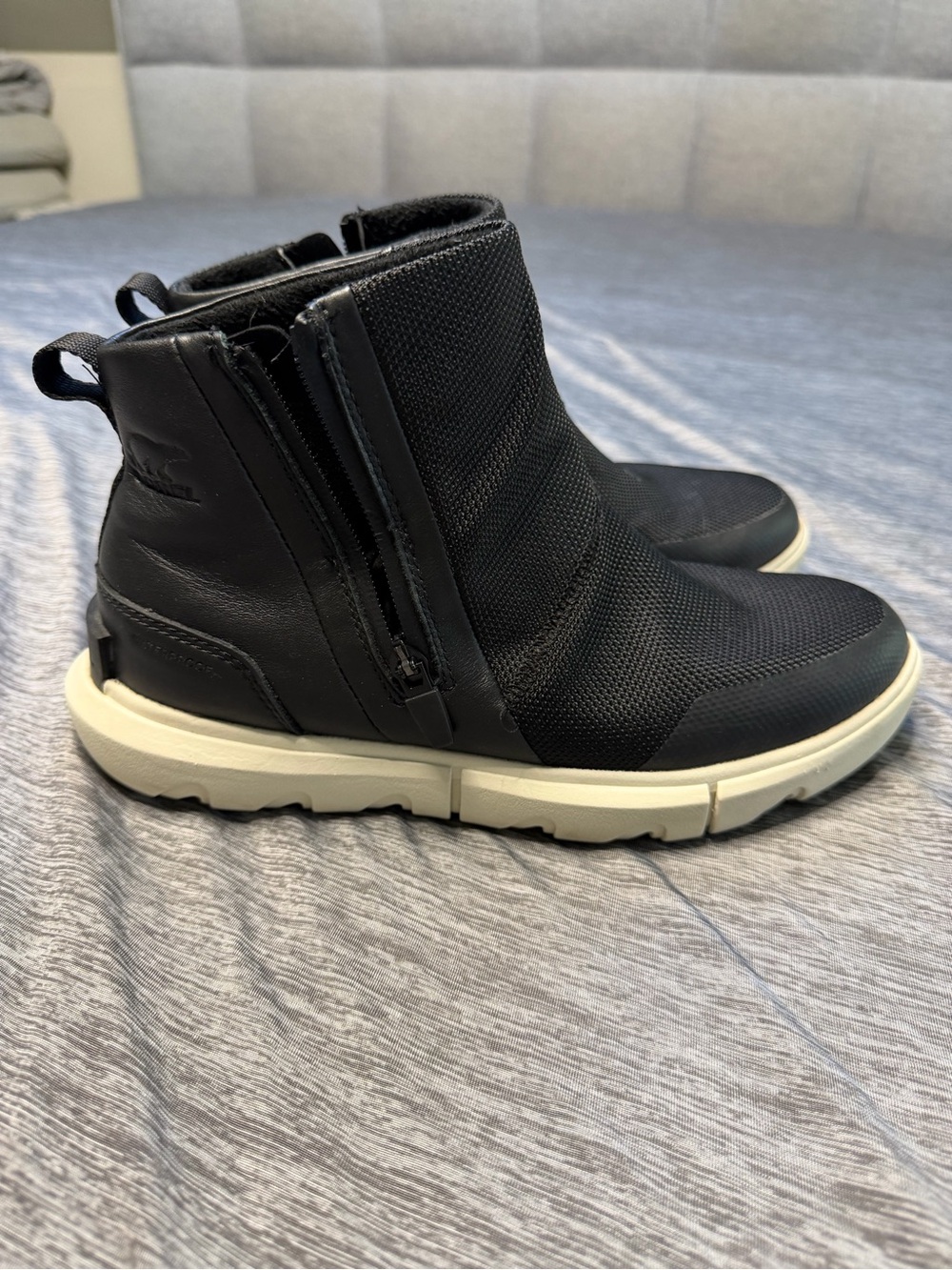 Sorel Black Slip-On Ankle Boots with Cream Sole